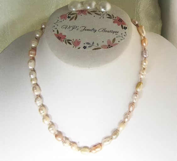 Necklace on a mannequin with a 'WP's Jewelry Boutique' display card in the background