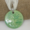 white myli-strand neclace with green pendant