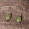 green gemstone drop earrings