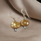 Handmade Kazuri Earrings in Honey and Gold Kazuri Beads