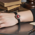 Women's Black Leather Bracelet with Red Leaf Motif Focus