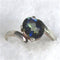 Buy Woman's right hand rainbow topaz ring