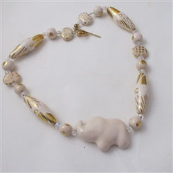 Cream and gold fair trade bead Kazuri elephant necklace