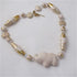 Cream and gold fair trade bead Kazuri elephant necklace
