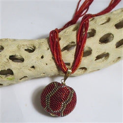 red necklace with handmade pendant
