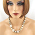 Buy rare dinosaur bone and handmade Raku bead necklace