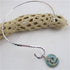 Neck wire with gemstone pendant