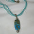 Exotic Aqua Lampwork Pendant on Aqua Seed Bead Necklace - VP's Jewelry