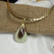 Gemstone Pendant on gold neckla wire