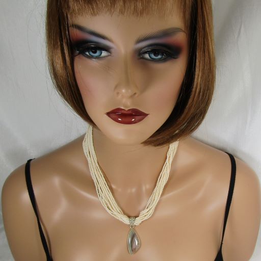 Cream  Multi-strand Necklace with  Petrified Wood Pendant