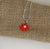 red flower pendant