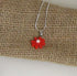 red flower pendant